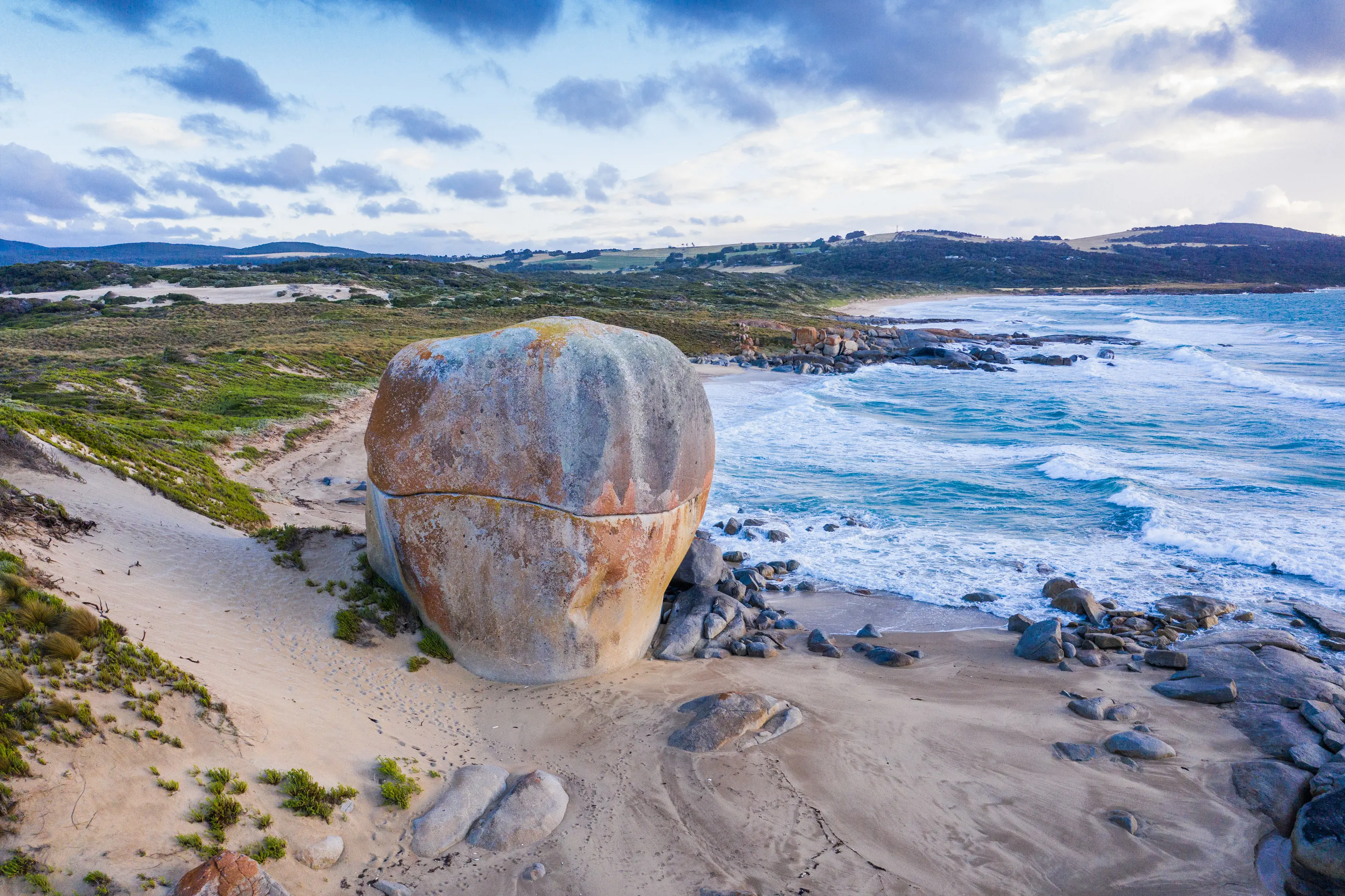 Castle Rock, a massive granite boulder by the shoreline on Marshall Beach