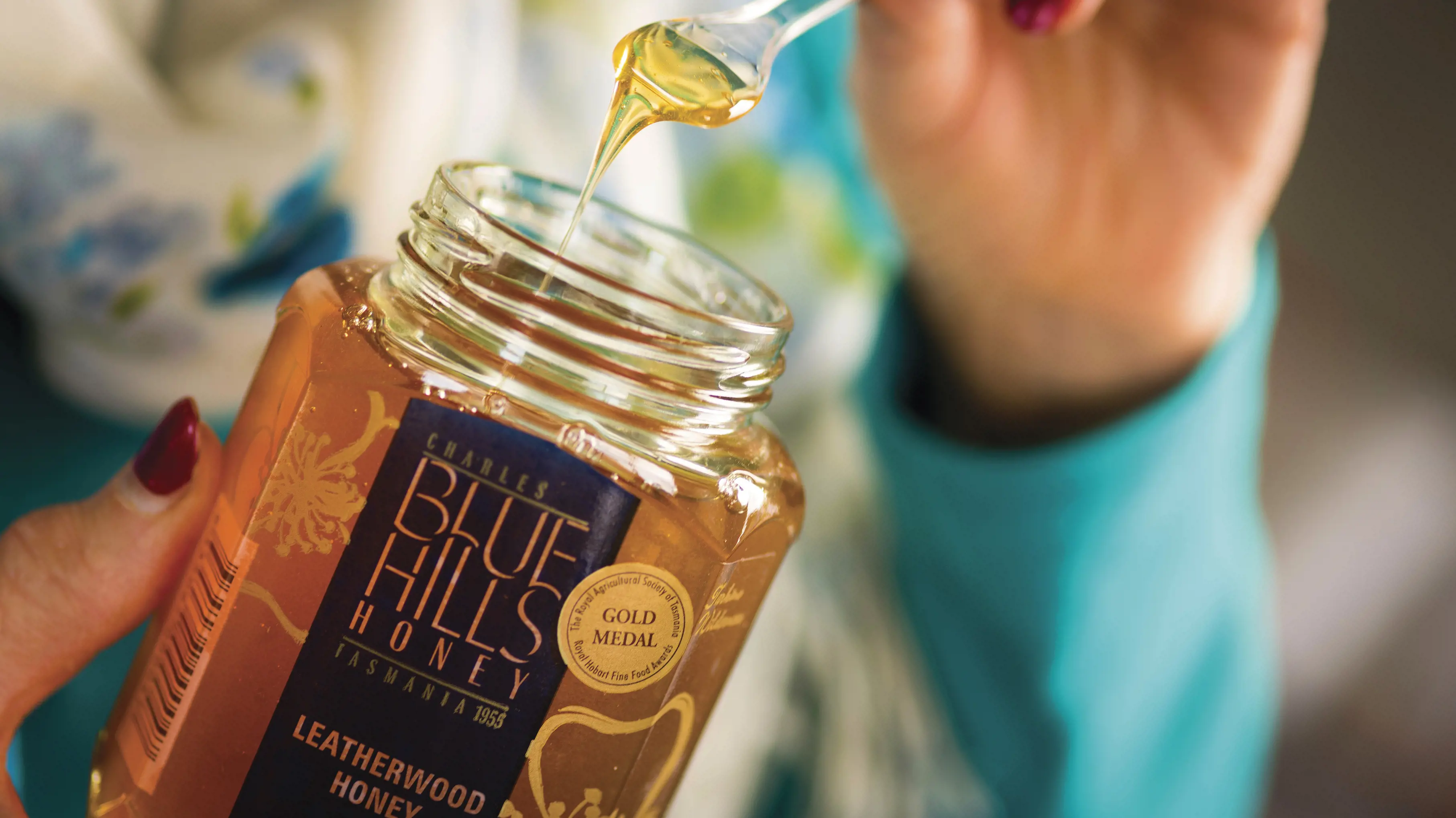 Close up of honey in a jar at Blue Hills Honey, the beekeepers producing honey sourced from the takayna / Tarkine wilderness of Tasmania.