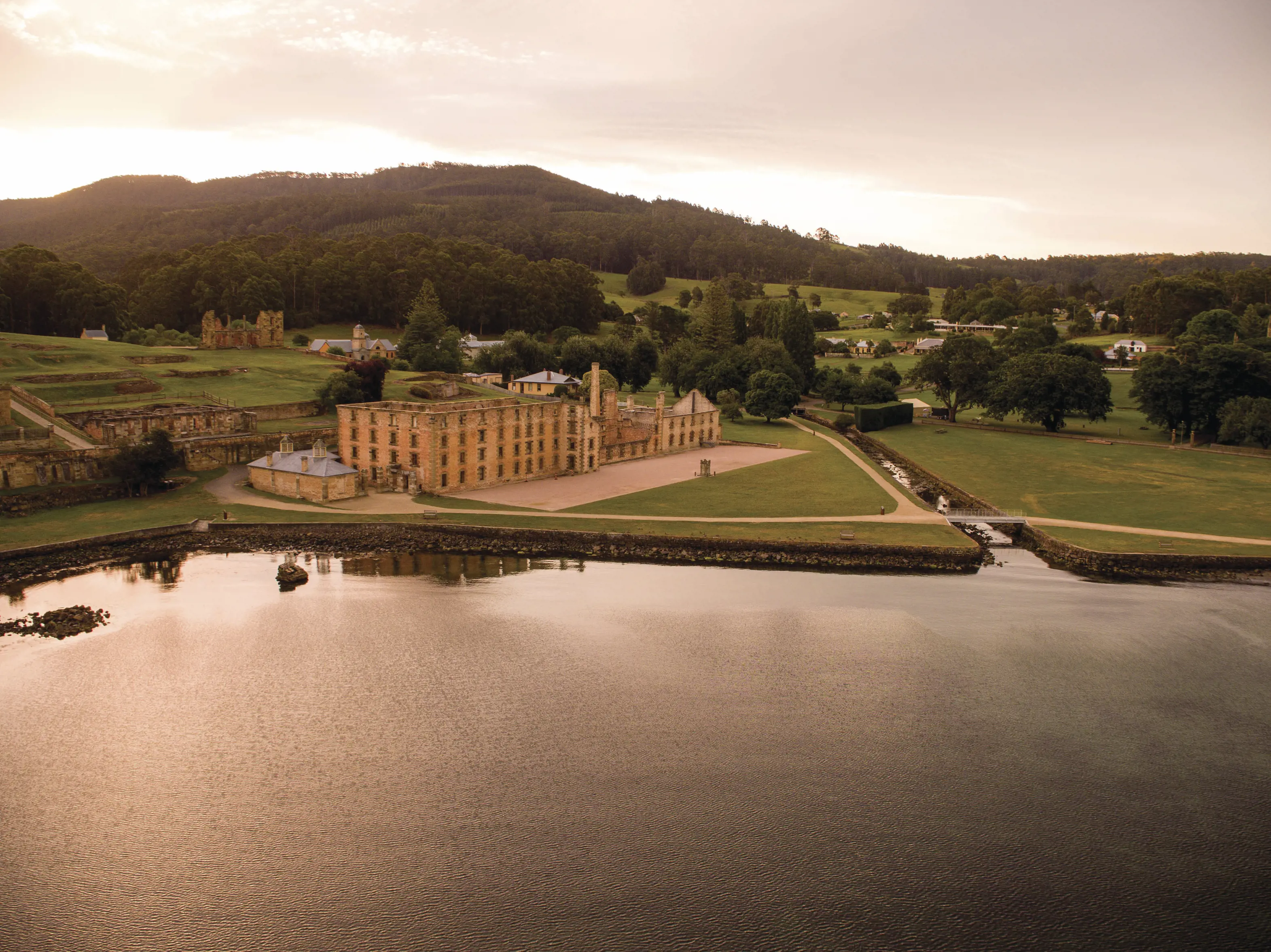 Stunning, golden aerial image of the Port Arthur Historic Site.