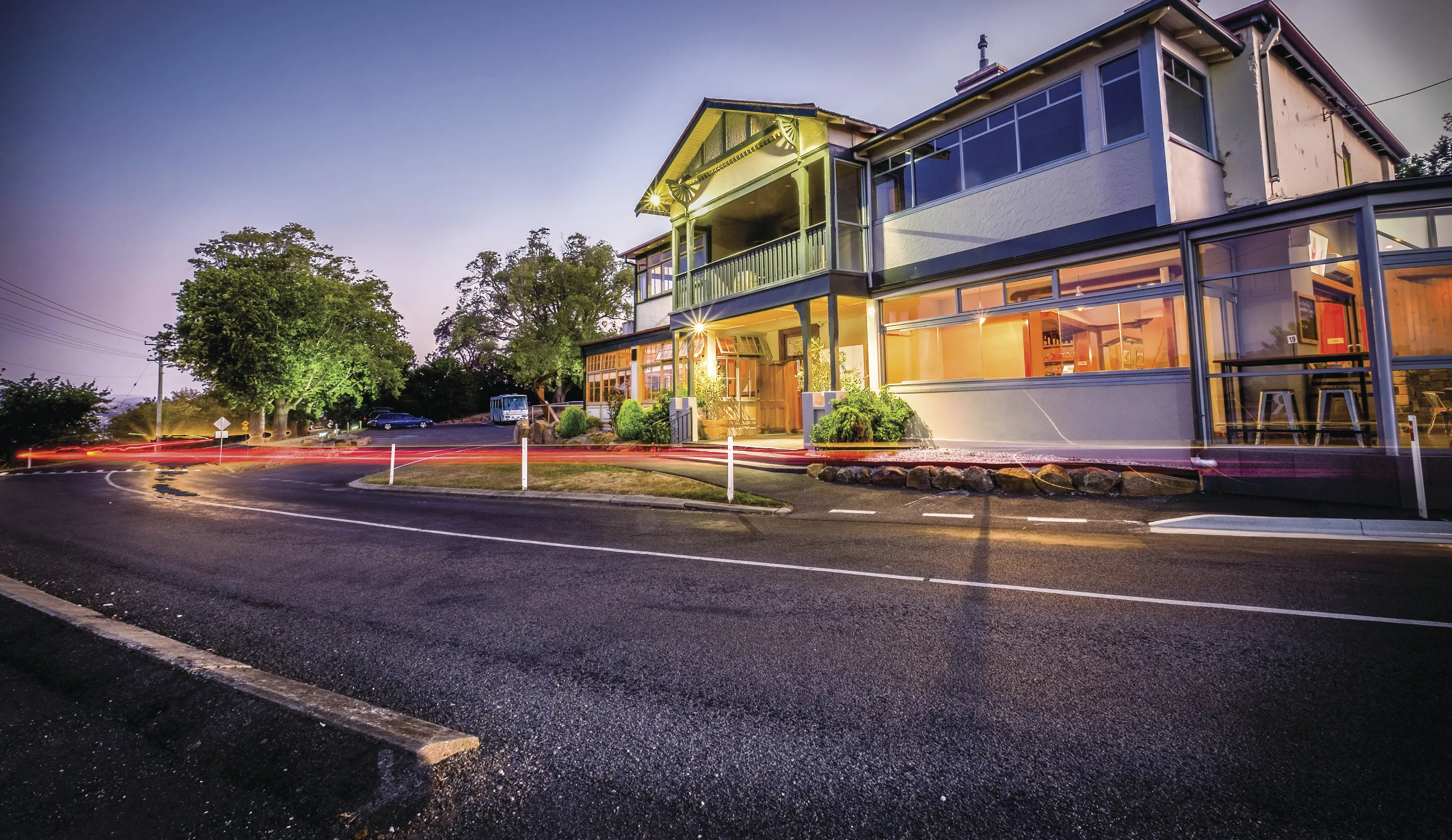 A blurred exterior image with bright lights coming Rosevears Hotel, Grindelwald.