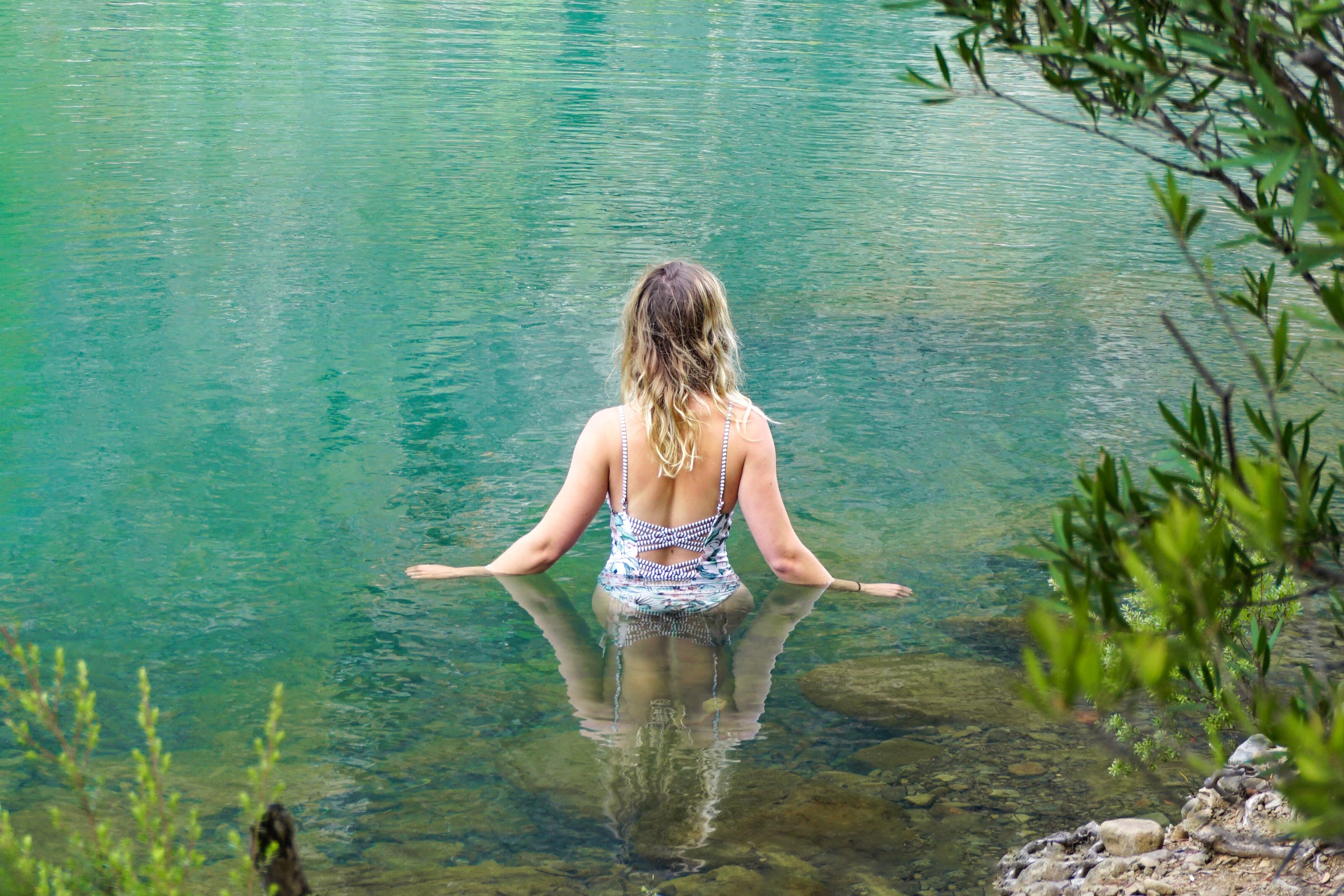 Woman swimming in the pools at Apsley Gorge.