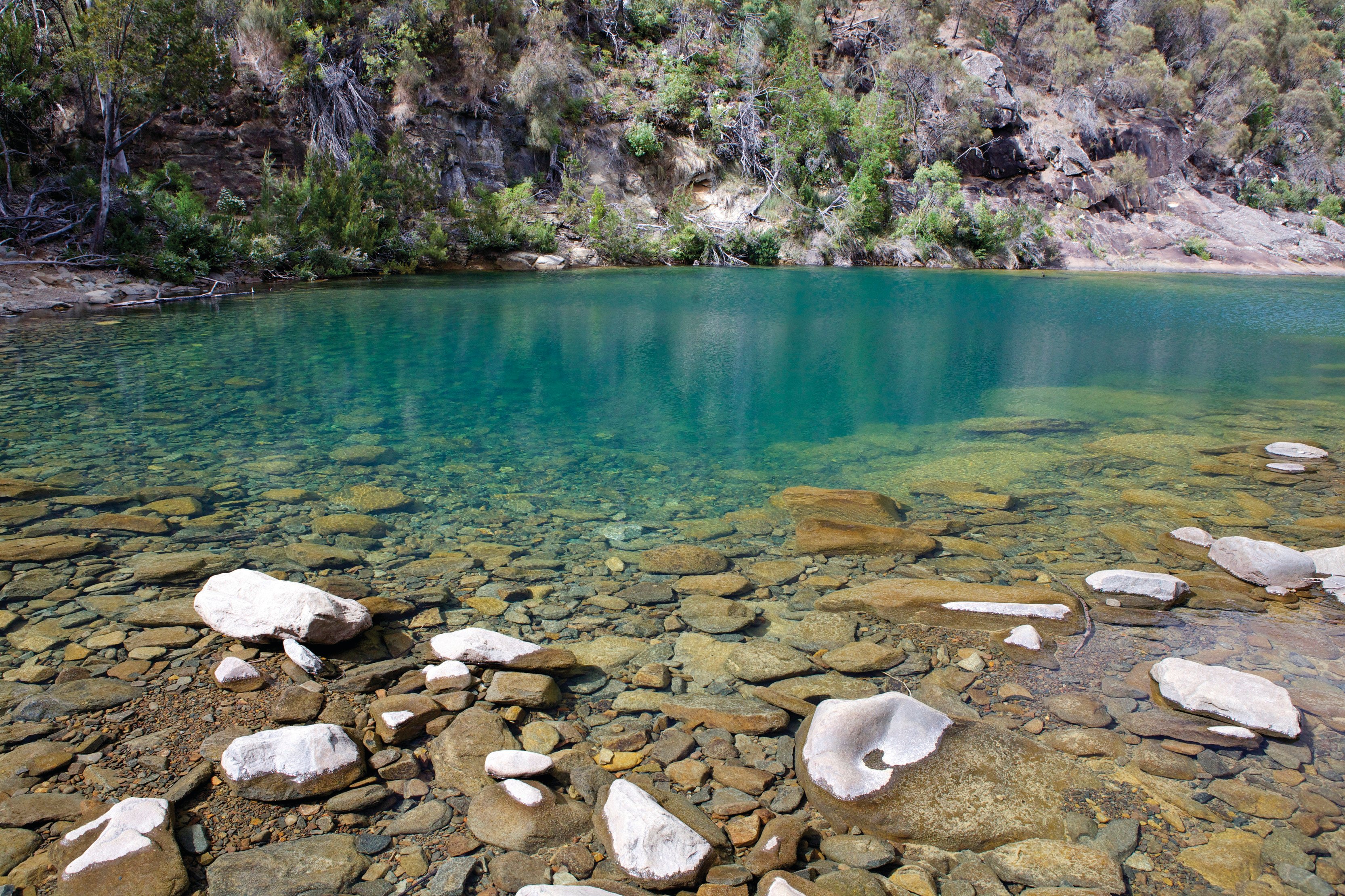 Stunning image of the Apsley River Waterhole and Gorge, with tranquil pools and undisturbed river scenes.