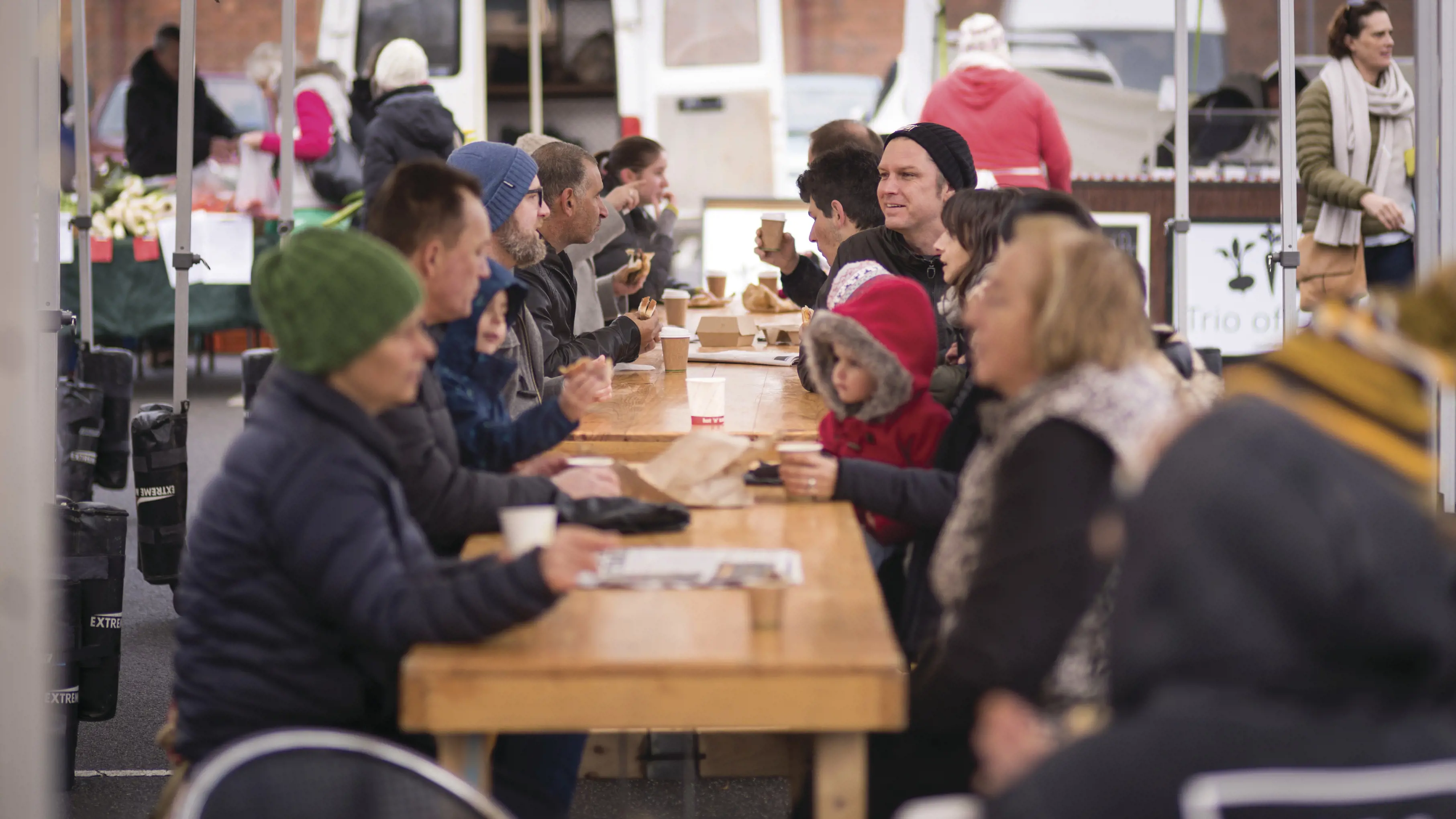 Harvest Launceston Farmers' Market. Enjoying a morning coffee and breakfast from one of the many food stalls at Launceston Farmers' Market.